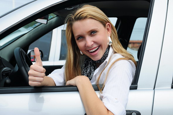 bigstock_Happy_Woman_Driving_A_New_Car_5981320