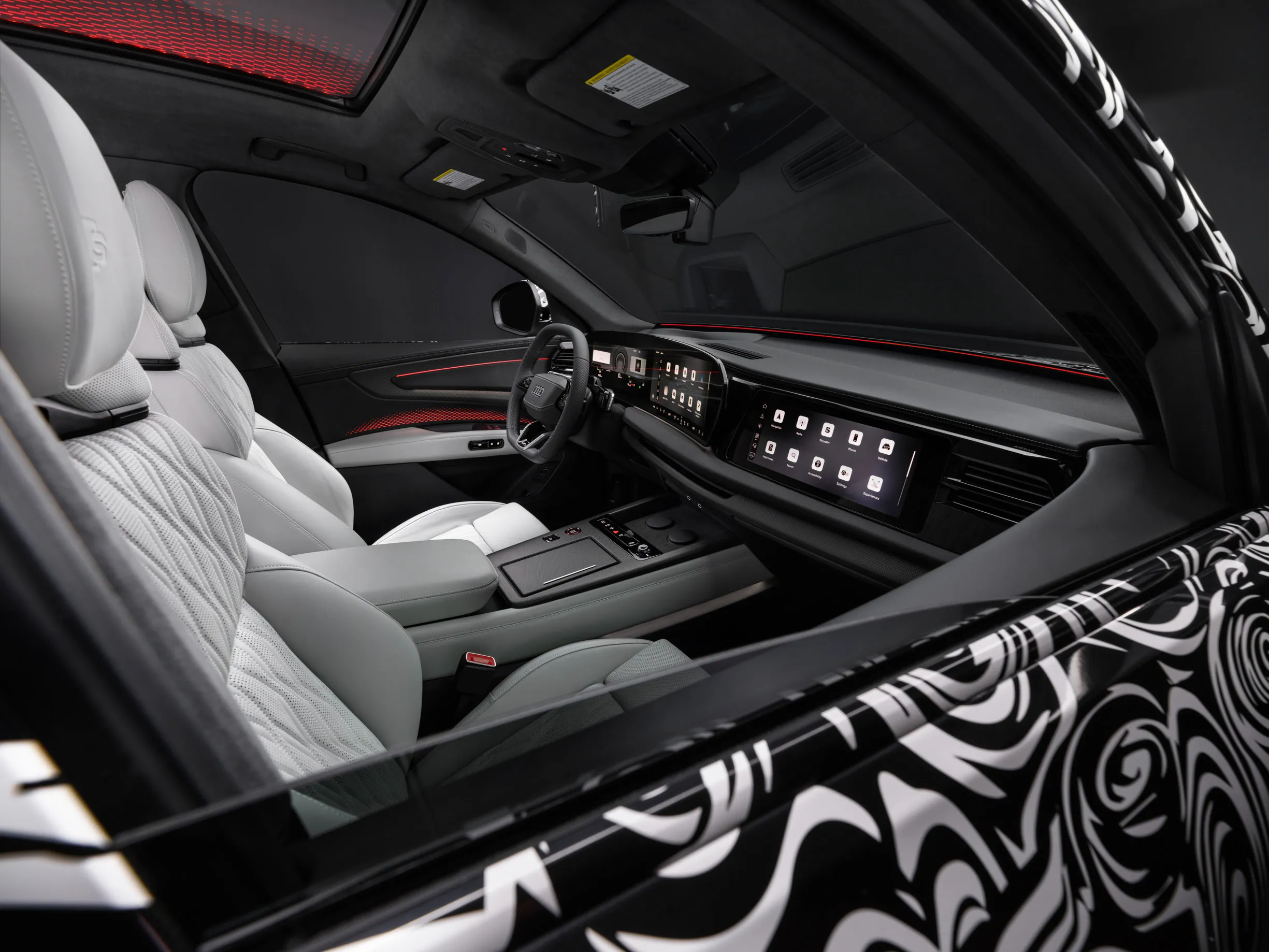 Así es el interior del SUV más lujoso de Audi: el Q9 con hasta siete plazas y que dice adiós al negro piano