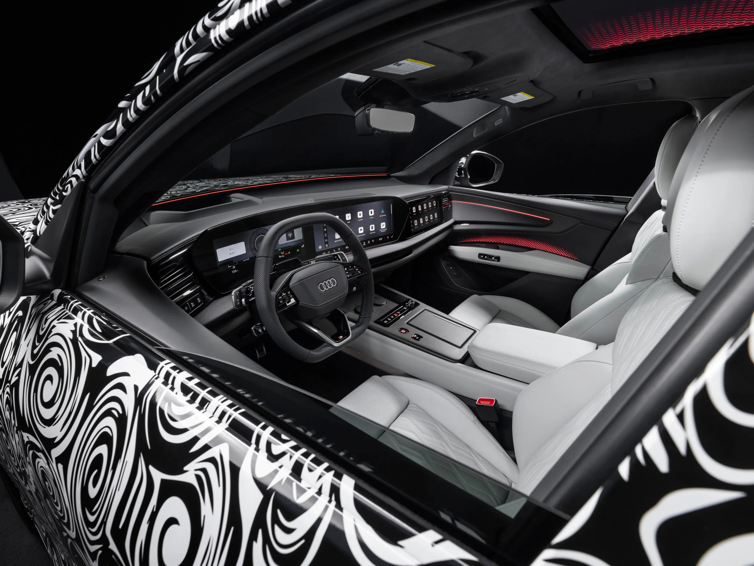 Así es el interior del SUV más lujoso de Audi: el Q9 con hasta siete plazas y que dice adiós al negro piano